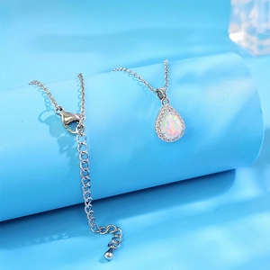 Water drop opal pendant necklace with sparkling cubic zirconia in polished finish