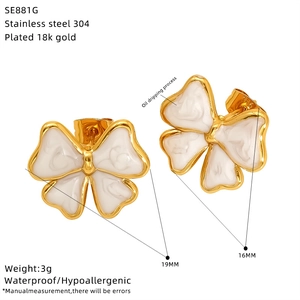 Detail view of 18k gold plated stainless steel bow earrings with 19mm size specs
