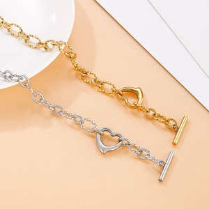 Golden and silver stainless steel heart pendant bracelets with OT buckle and twisted chain