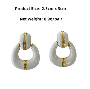 Detail view of retro gold-plated enamel earrings with dimensions 2.3cm by 3cm
