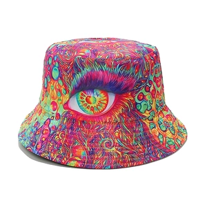 Detail of artistic bucket hat with colorful psychedelic print and realistic eye pattern