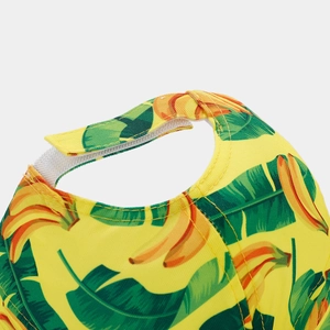Detail of adjustable velcro closure and stitching on tropical banana print baseball cap