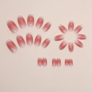 Pink ombre oval press-on nails with silver glitter tips in a French style 24pcs set