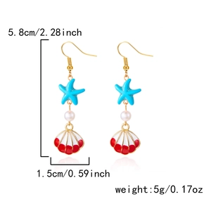 Detail view of sea shell earrings with dimensions 5.8cm height and 1.5cm width