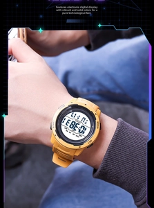 Close-up of vibrant yellow digital sports watch with LCD multi-function display