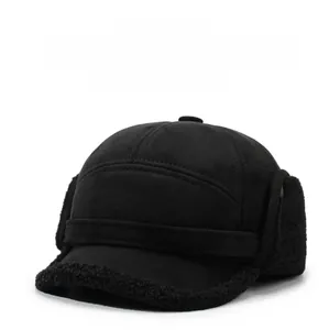 Close-up of winter sports baseball cap with black faux sheepskin fleece lining and ear flaps