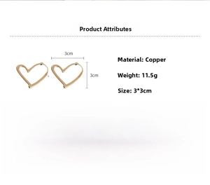 Detailed view of gold hollow heart earrings showing dimensions 3x3cm and copper material