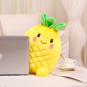 Cute yellow pineapple plush toy pillow with a sweet smiling face in a cozy home setting