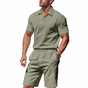 Detail of army green linen short sleeve polo and drawstring shorts set on model