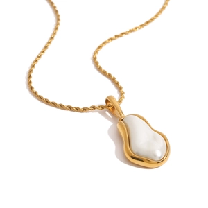 Elegant gold stainless steel necklace with irregular pendant and white baroque pearl