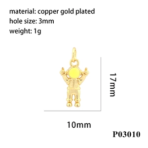 Detailed view of gold-plated astronaut charm with 17mm x 10mm dimensions and 3mm hole