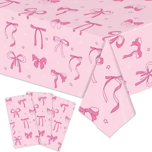 Pink bow and star pattern disposable tablecloth with matching napkins for girl's party