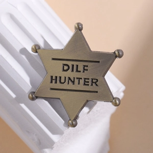 Antique bronze hexagonal star badge with DILF HUNTER engraving on white stone