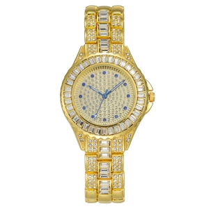 Luxurious gold-tone watch for women fully iced out with sparkling crystals and blue markers