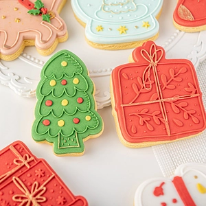 Christmas fondant cookie molds featuring reindeer and trees for holiday baking decoration