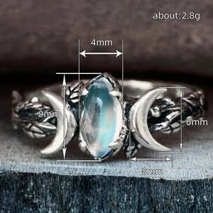Retro marquise moonstone ring with crescent moon accents and vintage leaf textures