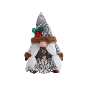 Nordic Christmas gnome plush with gray knit hat, braided beard, and wooden button detail