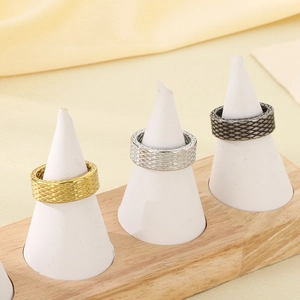Three-color minimalist wide rings with textured python pattern on wooden stands