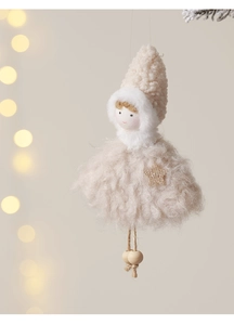Détail d'ange en peluche avec fausse fourrure blanc crème et étoile à paillettes dorées