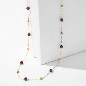 Collier chaîne dorée de luxe français avec perles de grenat rouge sur blocs géométriques