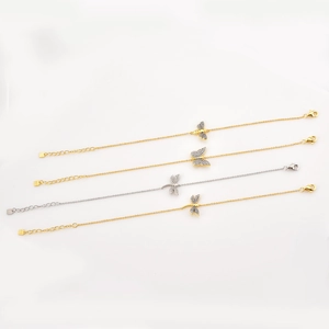 Detailed view of S925 sterling silver bracelets with bee and butterfly charms