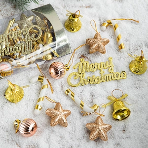 Golden and rose gold Christmas tree ornament set with stars, bells, and candy canes
