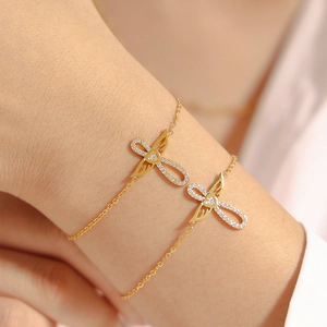 Bracelets double rang avec ailes d'ange et cœurs en zircon dorés et argentés