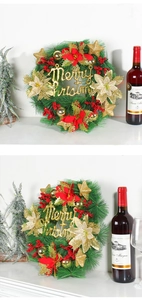 Detail of 35cm Christmas wreath with Merry Christmas sign, red berries and gold stars