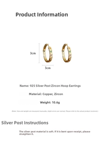 Detail view of 3cm gold circle hoop earrings with heart-shaped zircon stones