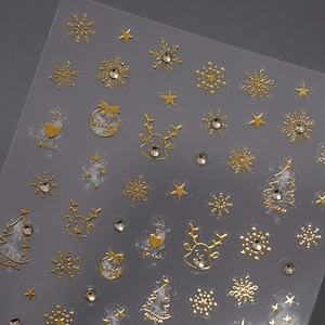 Christmas reindeer and snowflake nail art stickers with gold foil and rhinestones