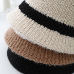 Foldable knitted bucket hats in black, khaki, and striped beige for winter warmth
