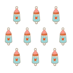 Macro detail of ten pink and blue enamel baby bottle charms for DIY jewelry making