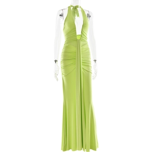 Detail of light green pleated halter maxi dress showing deep V-neck and soft draped fabric
