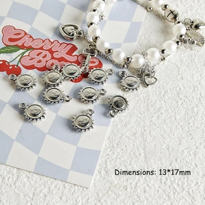 Detailed view of silver Y2K sun smiley face charm for DIY jewelry making 13x17mm