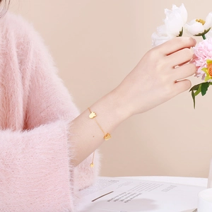 Elegant gold tulip pendant bracelet in stainless steel for women with delicate link chain