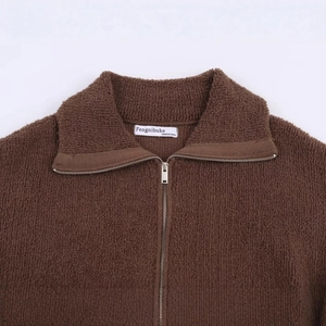 Brown wool-textured bomber jacket featuring a high-neck zipper and premium grain fabric