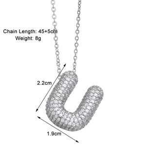Detail of silver necklace with crystal-encrusted letter U pendant and O-chain dimensions