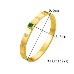 Dettaglio dimensioni bracciale dorato con pietra verde, peso 27g e diametro di 6,5cm