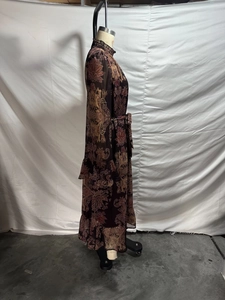 Detail view of Bohemian paisley chiffon long dress with ruffled hem and bell sleeves
