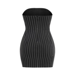 Detailed back view of a black bodycon tube dress with vertical silver pinstripes