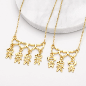 Gold plated heart pendant necklaces with boy and girl charms set with cubic zirconia