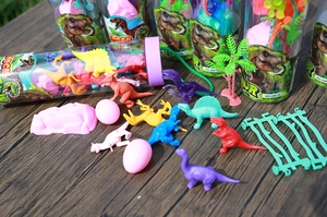 Detailed set of colorful mini dinosaur figures with fence and palm tree accessories
