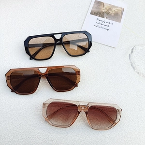 Three retro aviator sunglasses with double bridge frames displayed on white surface