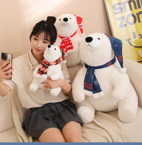 Three sizes of Christmas polar bear plush toys with knitted scarves and snowflake hats