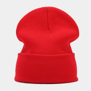 Classic ribbed knit beanie in vibrant red featuring a stylish wide folded cuff for winter warmth