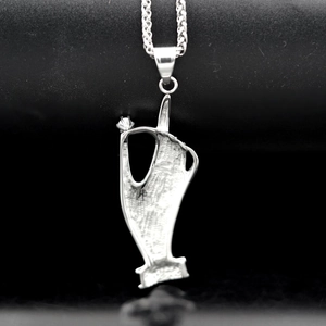 316 Stainless steel hand gesture pendant with gemstone and silver chain on black base