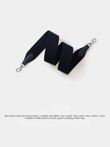 Close-up of 5cm wide navy blue woven shoulder strap with premium silver metal hooks