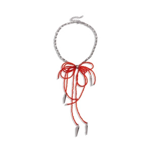 Gothic style silver chain necklace with red crystal beaded bow and spike tassels charm