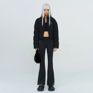 Slim fit black flare trousers and stand collar velvet down jacket on model