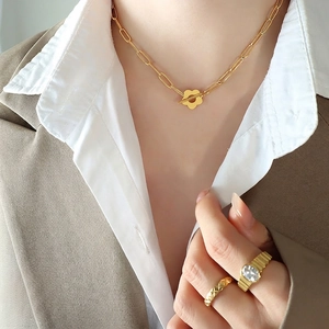 Vintage OT buckle gold chain necklace and textured ring set in 18k gold plated steel